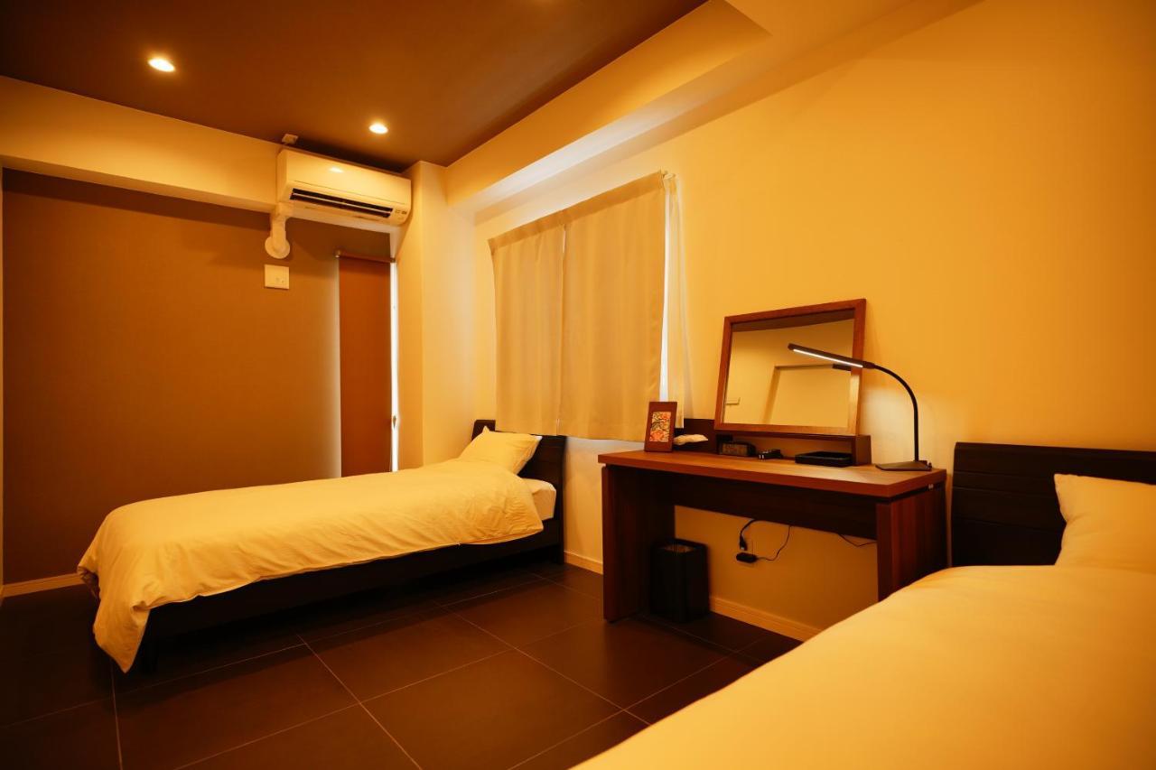 Appartamento Sunshine Coast Chatan Esterno foto