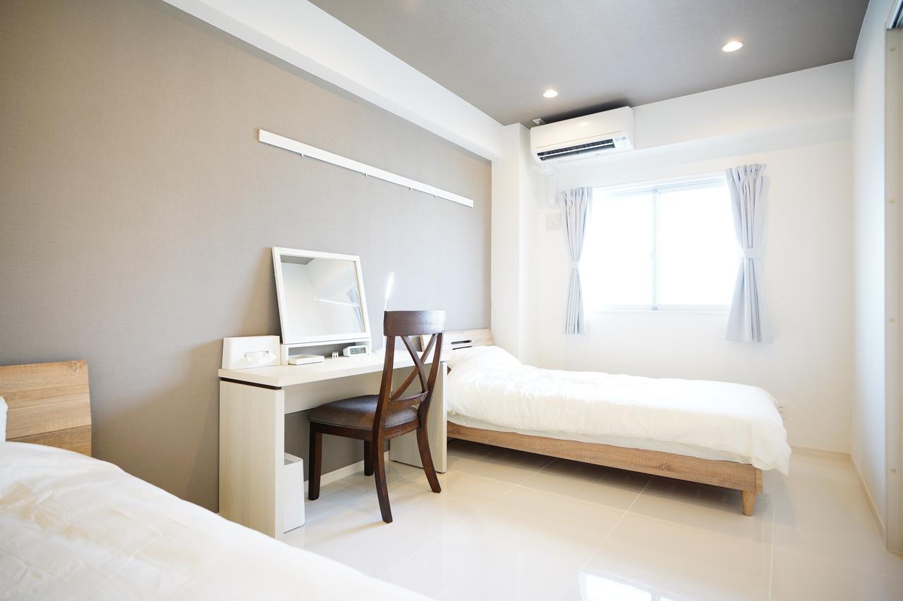 Appartamento Sunshine Coast Chatan Esterno foto